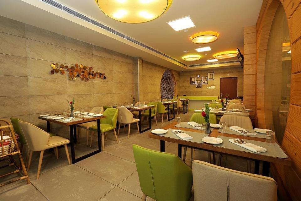 Hotel New York Square กัตตะยัม ภายนอก รูปภาพ